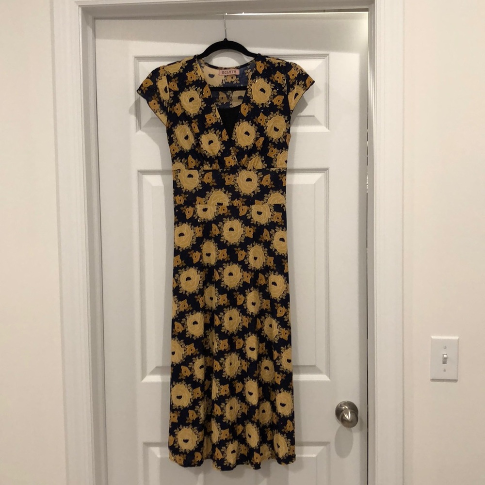 Navy dress with gold flower print. tie in back